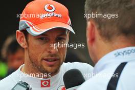 Jenson Button (GBR) McLaren with the media. 05.10.2013. Formula 1 World Championship, Rd 14, Korean Grand Prix, Yeongam, South Korea, Qualifying Day.