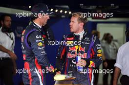 (L to R): Mark Webber (AUS) Red Bull Racing with team mate Sebastian Vettel (GER) Red Bull Racing in parc ferme. 05.10.2013. Formula 1 World Championship, Rd 14, Korean Grand Prix, Yeongam, South Korea, Qualifying Day.
