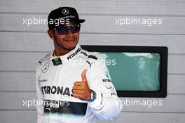 Lewis Hamilton (GBR) Mercedes AMG F1 celebrates his second position in parc ferme. 05.10.2013. Formula 1 World Championship, Rd 14, Korean Grand Prix, Yeongam, South Korea, Qualifying Day.