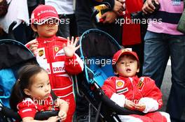 Young Ferrari fans. 05.10.2013. Formula 1 World Championship, Rd 14, Korean Grand Prix, Yeongam, South Korea, Qualifying Day.