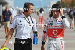 Sergio Perez (MEX) McLaren with Antti Vierula (FIN) Personal Trainer. 05.10.2013. Formula 1 World Championship, Rd 14, Korean Grand Prix, Yeongam, South Korea, Qualifying Day.