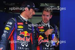 (L to R): Mark Webber (AUS) Red Bull Racing with Sebastian Vettel (GER) Red Bull Racing in parc ferme. 05.10.2013. Formula 1 World Championship, Rd 14, Korean Grand Prix, Yeongam, South Korea, Qualifying Day.