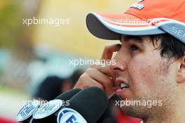 Sergio Perez (MEX) McLaren with the media. 05.10.2013. Formula 1 World Championship, Rd 14, Korean Grand Prix, Yeongam, South Korea, Qualifying Day.