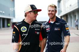 (L to R): Kimi Raikkonen (FIN) Lotus F1 Team with Sebastian Vettel (GER) Red Bull Racing. 05.10.2013. Formula 1 World Championship, Rd 14, Korean Grand Prix, Yeongam, South Korea, Qualifying Day.