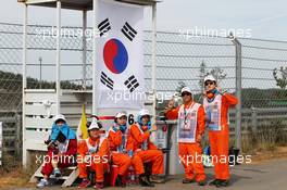 Marshals. 05.10.2013. Formula 1 World Championship, Rd 14, Korean Grand Prix, Yeongam, South Korea, Qualifying Day.