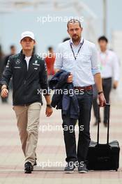 Nico Rosberg (GER) Mercedes AMG F1 with Georg Nolte (GER) Driver Manager. 06.10.2013. Formula 1 World Championship, Rd 14, Korean Grand Prix, Yeongam, South Korea, Race Day.