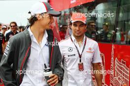 (L to R): Esteban Gutierrez (MEX) Sauber and Sergio Perez (MEX) McLaren on the drivers parade. 06.10.2013. Formula 1 World Championship, Rd 14, Korean Grand Prix, Yeongam, South Korea, Race Day.