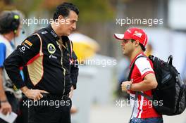 Felipe Massa (BRA) Ferrari with Federico Gastaldi (ARG) Lotus F1 Team Commercial Director. 06.10.2013. Formula 1 World Championship, Rd 14, Korean Grand Prix, Yeongam, South Korea, Race Day.