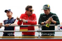 (L to R): Valtteri Bottas (FIN) Williams with Jules Bianchi (FRA) Marussia F1 Team and Charles Pic (FRA) Caterham on the drivers parade. 06.10.2013. Formula 1 World Championship, Rd 14, Korean Grand Prix, Yeongam, South Korea, Race Day.
