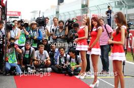 Photographers on the drivers parade. 06.10.2013. Formula 1 World Championship, Rd 14, Korean Grand Prix, Yeongam, South Korea, Race Day.