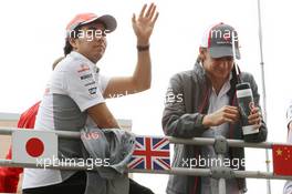(L to R): Sergio Perez (MEX) McLaren and Esteban Gutierrez (MEX) Sauber on the drivers parade. 06.10.2013. Formula 1 World Championship, Rd 14, Korean Grand Prix, Yeongam, South Korea, Race Day.