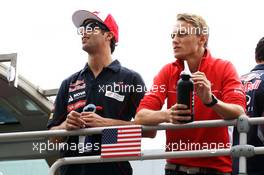 (L to R): Daniel Ricciardo (AUS) Scuderia Toro Rosso and Max Chilton (GBR) Marussia F1 Team on the drivers parade. 06.10.2013. Formula 1 World Championship, Rd 14, Korean Grand Prix, Yeongam, South Korea, Race Day.
