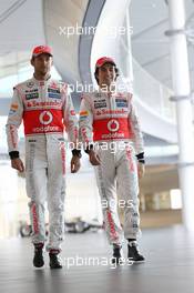 (L to R): Jenson Button (GBR) McLaren with team mate Sergio Perez (MEX) McLaren. 31.01.2013. McLaren MP4-28 Launch, McLaren Technology Centre, Woking, England.