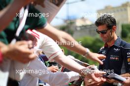 Mark Webber (AUS) Red Bull Racing signs autographs for the fans. 24.05.2013. Formula 1 World Championship, Rd 6, Monaco Grand Prix, Monte Carlo, Monaco, Friday.