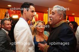 (L to R): Adrian Sutil (GER) Sahara Force India F1 with girlfriend Jennifer Becks (GER) and Dr. Vijay Mallya (IND) Sahara Force India F1 Team Owner at the Signature F1 Monaco Party. 23-24.05.2013. Formula 1 World Championship, Rd 6, Monaco Grand Prix, The Signature F1 Boat Party, Monte Carlo, Monaco, Friday.