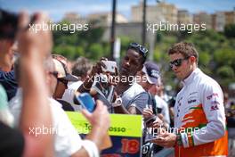 Paul di Resta (GBR) Sahara Force India F1 signs autographs for the fans. 24.05.2013. Formula 1 World Championship, Rd 6, Monaco Grand Prix, Monte Carlo, Monaco, Friday.