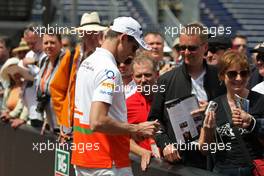 Adrian Sutil (GER) Sahara Force India F1 signs autographs for the fans. 24.05.2013. Formula 1 World Championship, Rd 6, Monaco Grand Prix, Monte Carlo, Monaco, Friday.
