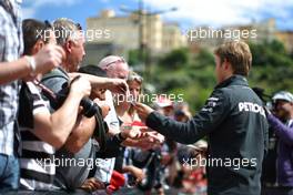 Nico Rosberg (GER) Mercedes AMG F1 signs autographs for the fans. 24.05.2013. Formula 1 World Championship, Rd 6, Monaco Grand Prix, Monte Carlo, Monaco, Friday.