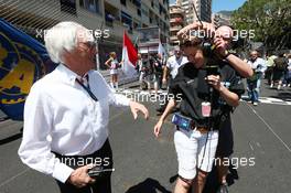 (L to R): Bernie Ecclestone (GBR) CEO Formula One Group (FOM) with Jenny Gow (GBR) BBC Radio 5 Live Pitlane Reporter on the grid. 26.05.2013. Formula 1 World Championship, Rd 6, Monaco Grand Prix, Monte Carlo, Monaco, Race Day.