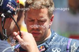 Sebastian Vettel (GER) Red Bull Racing on the grid. 26.05.2013. Formula 1 World Championship, Rd 6, Monaco Grand Prix, Monte Carlo, Monaco, Race Day.