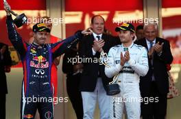 Sebastian Vettel (GER) Red Bull Racing (Left) celebrates his second position on the podium with race winner Nico Rosberg (GER) Mercedes AMG F1. 26.05.2013. Formula 1 World Championship, Rd 6, Monaco Grand Prix, Monte Carlo, Monaco, Race Day.