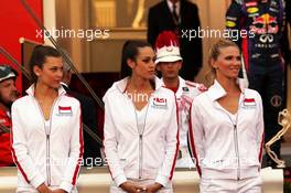 Grid girls at the podium. 26.05.2013. Formula 1 World Championship, Rd 6, Monaco Grand Prix, Monte Carlo, Monaco, Race Day.