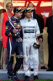 The podium (L to R): second placed Sebastian Vettel (GER) Red Bull Racing and race winner Nico Rosberg (GER) Mercedes AMG F1 on the podium. 26.05.2013. Formula 1 World Championship, Rd 6, Monaco Grand Prix, Monte Carlo, Monaco, Race Day.