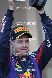 Sebastian Vettel (GER) Red Bull Racing celebrates his second position on the podium. 26.05.2013. Formula 1 World Championship, Rd 6, Monaco Grand Prix, Monte Carlo, Monaco, Race Day.