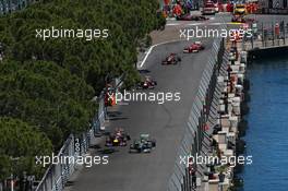 Lewis Hamilton (GBR) Mercedes AMG F1 W04 and Sebastian Vettel (GER) Red Bull Racing RB9 battle for position. 26.05.2013. Formula 1 World Championship, Rd 6, Monaco Grand Prix, Monte Carlo, Monaco, Race Day.