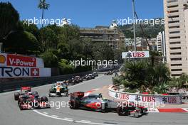 Sergio Perez (MEX) McLaren MP4-28 and Jenson Button (GBR) McLaren MP4-28. 26.05.2013. Formula 1 World Championship, Rd 6, Monaco Grand Prix, Monte Carlo, Monaco, Race Day.