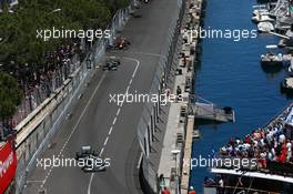 Nico Rosberg (GER) Mercedes AMG F1 W04 leads Lewis Hamilton (GBR) Mercedes AMG F1 W04 and Sebastian Vettel (GER) Red Bull Racing RB9. 26.05.2013. Formula 1 World Championship, Rd 6, Monaco Grand Prix, Monte Carlo, Monaco, Race Day.