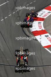Mark Webber (AUS) Red Bull Racing RB9 leads Kimi Raikkonen (FIN) Lotus F1 E21. 26.05.2013. Formula 1 World Championship, Rd 6, Monaco Grand Prix, Monte Carlo, Monaco, Race Day.