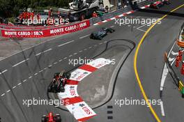 Lewis Hamilton (GBR) Mercedes AMG F1 W04 leads Kimi Raikkonen (FIN) Lotus F1 E21. 26.05.2013. Formula 1 World Championship, Rd 6, Monaco Grand Prix, Monte Carlo, Monaco, Race Day.