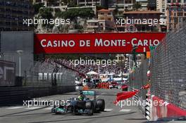 Nico Rosberg (GER) Mercedes AMG F1 W04 passes red flags as the race is stopped. 26.05.2013. Formula 1 World Championship, Rd 6, Monaco Grand Prix, Monte Carlo, Monaco, Race Day.