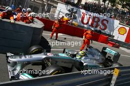 Nico Rosberg (GER) Mercedes AMG F1 W04 passes the crash of Pastor Maldonado (VEN) Williams FW35, which stopped the race. 26.05.2013. Formula 1 World Championship, Rd 6, Monaco Grand Prix, Monte Carlo, Monaco, Race Day.