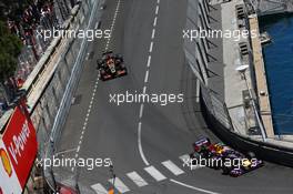 Mark Webber (AUS) Red Bull Racing RB9 leads Kimi Raikkonen (FIN) Lotus F1 E21. 26.05.2013. Formula 1 World Championship, Rd 6, Monaco Grand Prix, Monte Carlo, Monaco, Race Day.