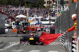 Sebastian Vettel (GER) Red Bull Racing RB9 passes red flags as the race is stopped. 26.05.2013. Formula 1 World Championship, Rd 6, Monaco Grand Prix, Monte Carlo, Monaco, Race Day.