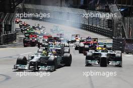 (L to R): Nico Rosberg (GER) Mercedes AMG F1 W04 and team mate Lewis Hamilton (GBR) Mercedes AMG F1 W04 lead at the start of the race. 26.05.2013. Formula 1 World Championship, Rd 6, Monaco Grand Prix, Monte Carlo, Monaco, Race Day.