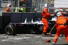 Marshals clear the crash of Pastor Maldonado (VEN) Williams FW35, which stopped the race. 26.05.2013. Formula 1 World Championship, Rd 6, Monaco Grand Prix, Monte Carlo, Monaco, Race Day.