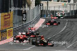 Kimi Raikkonen (FIN) Lotus F1 E21 and Fernando Alonso (ESP) Ferrari F138. 26.05.2013. Formula 1 World Championship, Rd 6, Monaco Grand Prix, Monte Carlo, Monaco, Race Day.