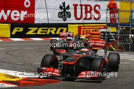 Sergio Perez (MEX) McLaren MP4-28 leads team mate Jenson Button (GBR) McLaren MP4-28. 26.05.2013. Formula 1 World Championship, Rd 6, Monaco Grand Prix, Monte Carlo, Monaco, Race Day.