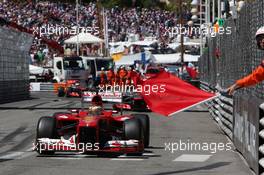 Fernando Alonso (ESP) Ferrari F138 passes red flags as the race is stopped. 26.05.2013. Formula 1 World Championship, Rd 6, Monaco Grand Prix, Monte Carlo, Monaco, Race Day.