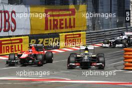 Esteban Gutierrez (MEX) Sauber C32 passes Max Chilton (GBR) Marussia F1 Team MR02. 26.05.2013. Formula 1 World Championship, Rd 6, Monaco Grand Prix, Monte Carlo, Monaco, Race Day.