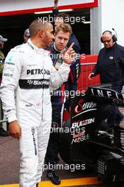 Lewis Hamilton (GBR) Mercedes AMG F1 with Sebastian Vettel (GER) Red Bull Racing in parc ferme. 25.05.2013. Formula 1 World Championship, Rd 6, Monaco Grand Prix, Monte Carlo, Monaco, Qualifying Day