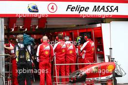 Felipe Massa (BRA) Ferrari waits during qualifying to see if mechanics can repair his Ferrari F138. 25.05.2013. Formula 1 World Championship, Rd 6, Monaco Grand Prix, Monte Carlo, Monaco, Qualifying Day