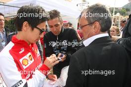 Kamui Kobayashi (JPN) signs autographs for the fans. 25.05.2013. Formula 1 World Championship, Rd 6, Monaco Grand Prix, Monte Carlo, Monaco, Qualifying Day