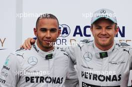 (L to R): second placed Lewis Hamilton (GBR) Mercedes AMG F1 with his team mate Nico Rosberg (GER) Mercedes AMG F1, who took pole position, in parc ferme. 25.05.2013. Formula 1 World Championship, Rd 6, Monaco Grand Prix, Monte Carlo, Monaco, Qualifying Day