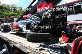 The damaged Lotus F1 E21 of Romain Grosjean (FRA) Lotus F1 Team is recovered back to the pits on the back of a truck. 25.05.2013. Formula 1 World Championship, Rd 6, Monaco Grand Prix, Monte Carlo, Monaco, Qualifying Day