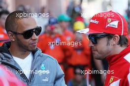 (L to R): Lewis Hamilton (GBR) Mercedes AMG F1 with Fernando Alonso (ESP) Ferrari on the drivers parade. 26.05.2013. Formula 1 World Championship, Rd 6, Monaco Grand Prix, Monte Carlo, Monaco, Race Day.