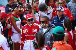 (L to R): Fernando Alonso (ESP) Ferrari and Lewis Hamilton (GBR) Mercedes AMG F1 on the drivers parade. 26.05.2013. Formula 1 World Championship, Rd 6, Monaco Grand Prix, Monte Carlo, Monaco, Race Day.